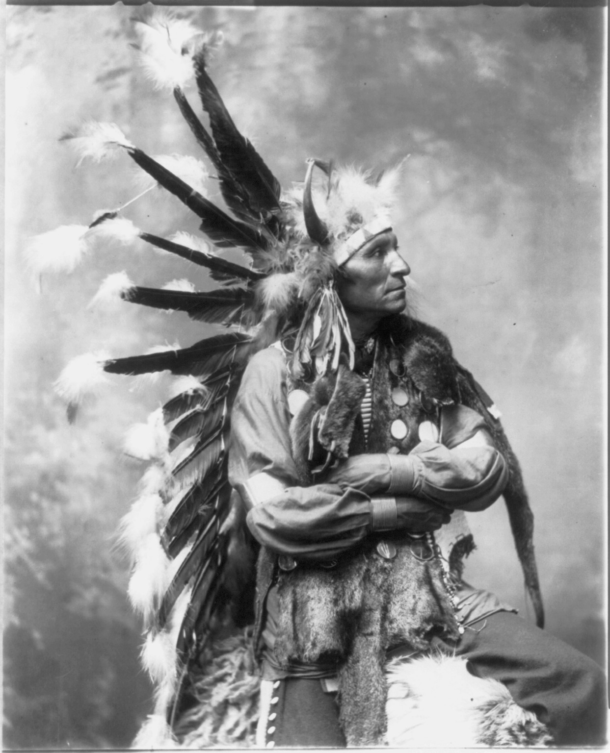 [Little Horse, Og Sioux, three-quarter length portrait, facing right], c1899. — historic photograph