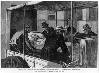 Removing the President (Garfield) from the express wagon to the railway car