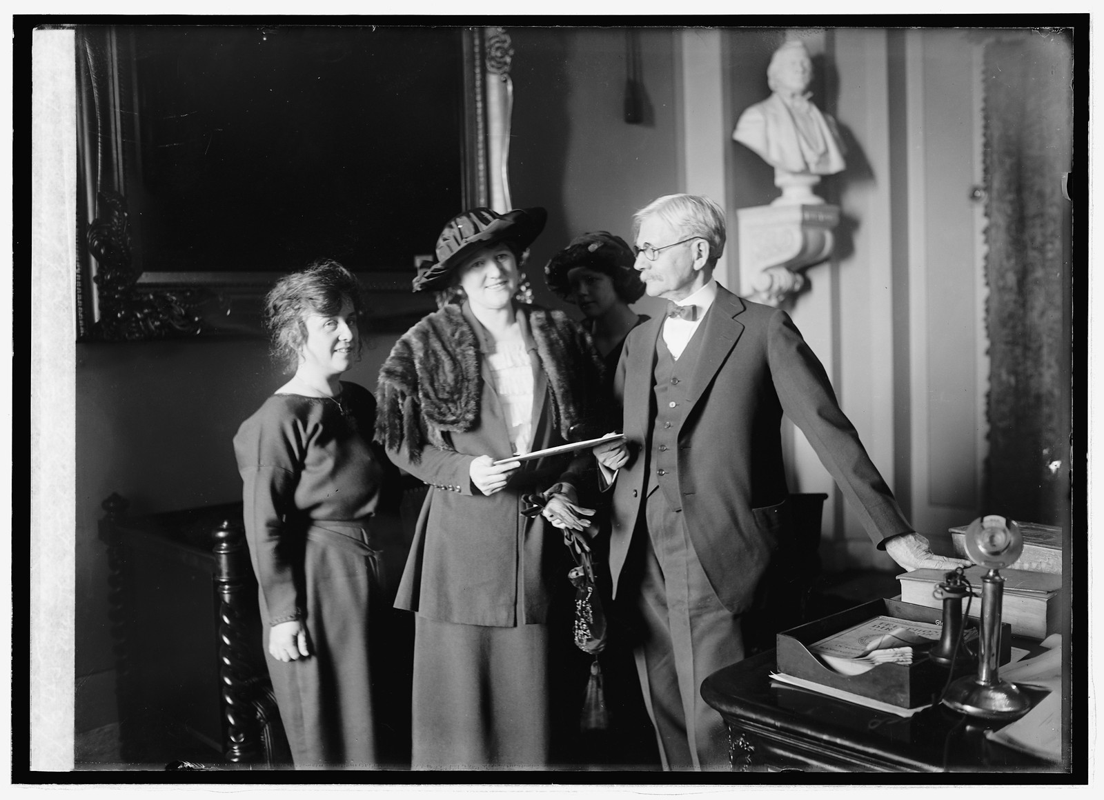 Mrs. Thos. D. Schall, Mrs. Eugene Drendome & Vice Pres. delivering the electorial vote o, [19]21 January 24. — historic photograph