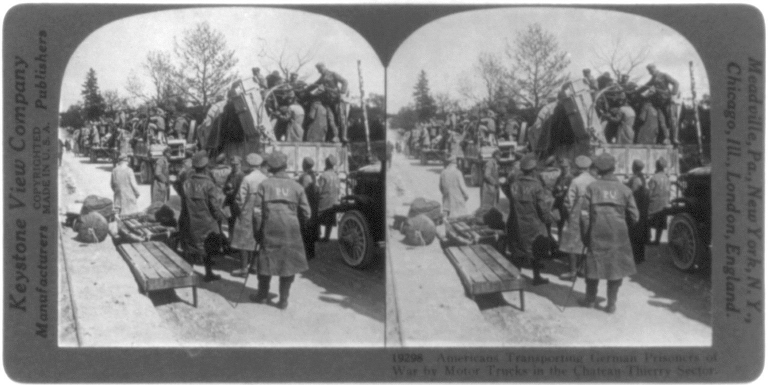 Americans Transporting German Prisoners of War by Motor Trucks in the Chateau-Thierry Sector, c1929 Aug. 5. — historic photograph