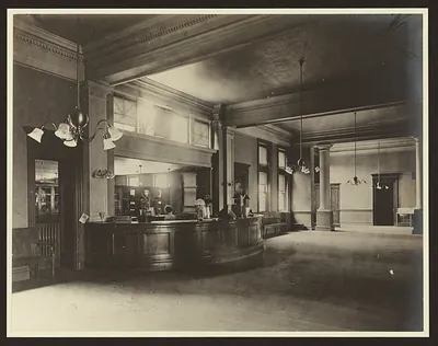 Library delivery room interior with curved wooden counter