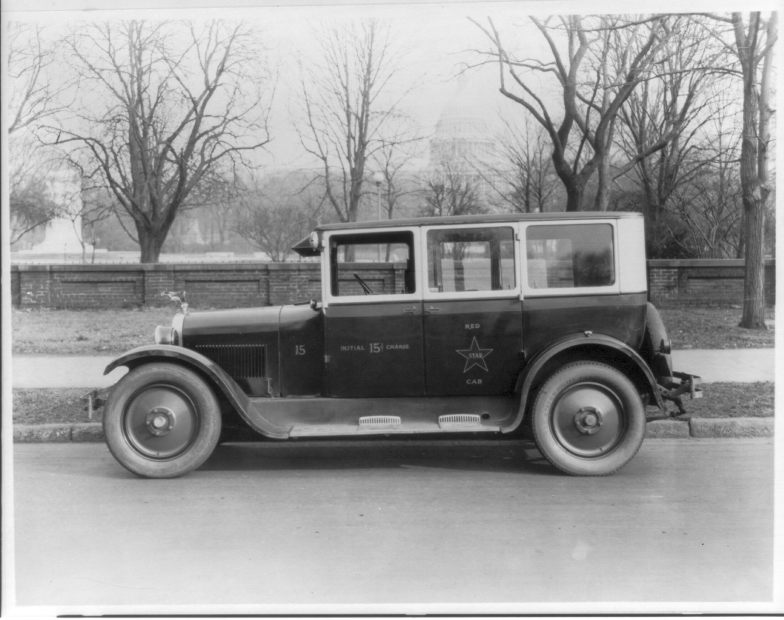 [Taxicabs in Washington, D.C.: Red Star" - Capitol in bg.]" — historic photograph