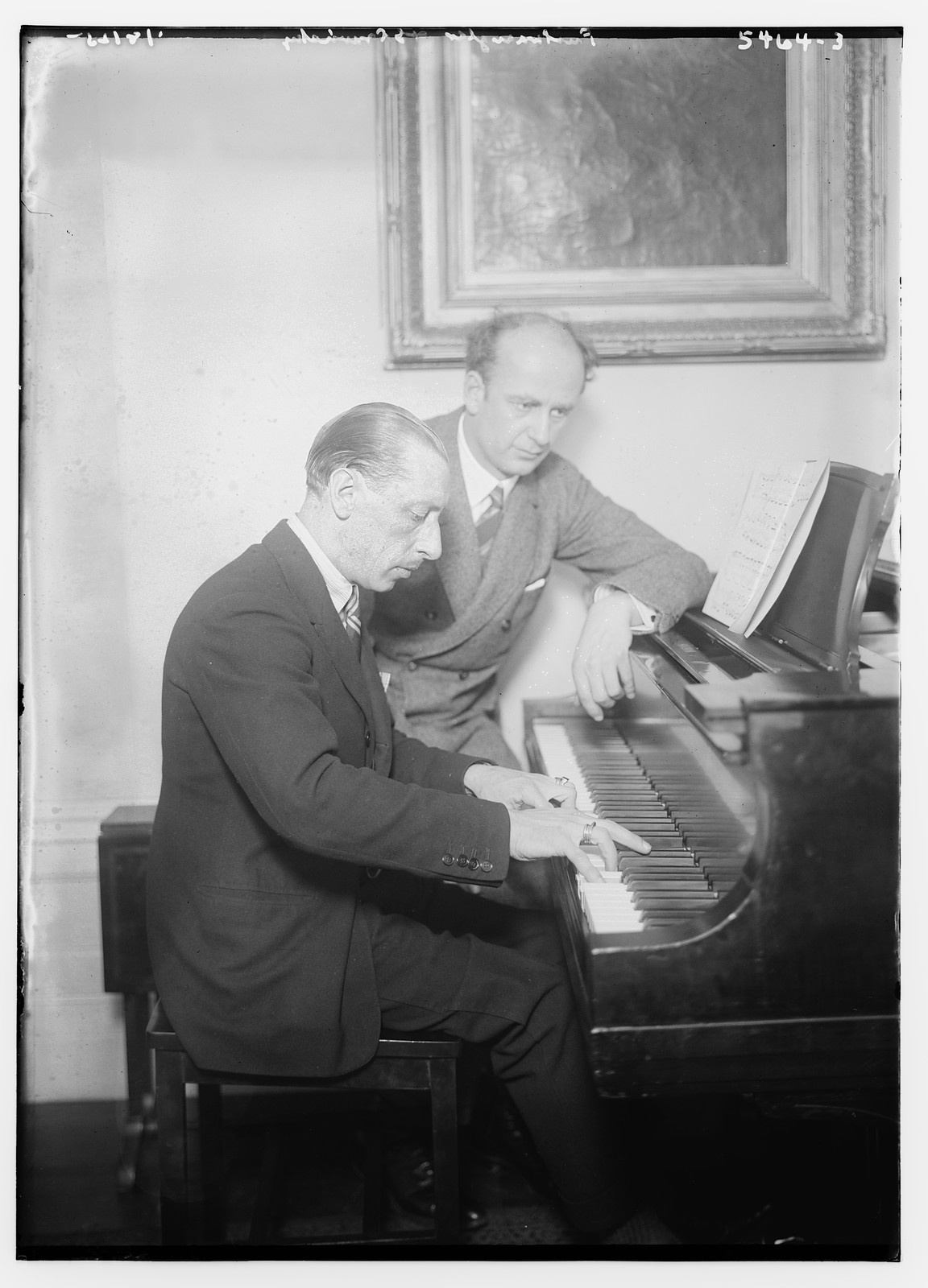 Stravinsky and Fulwaagder at piano, n/a — historic photograph