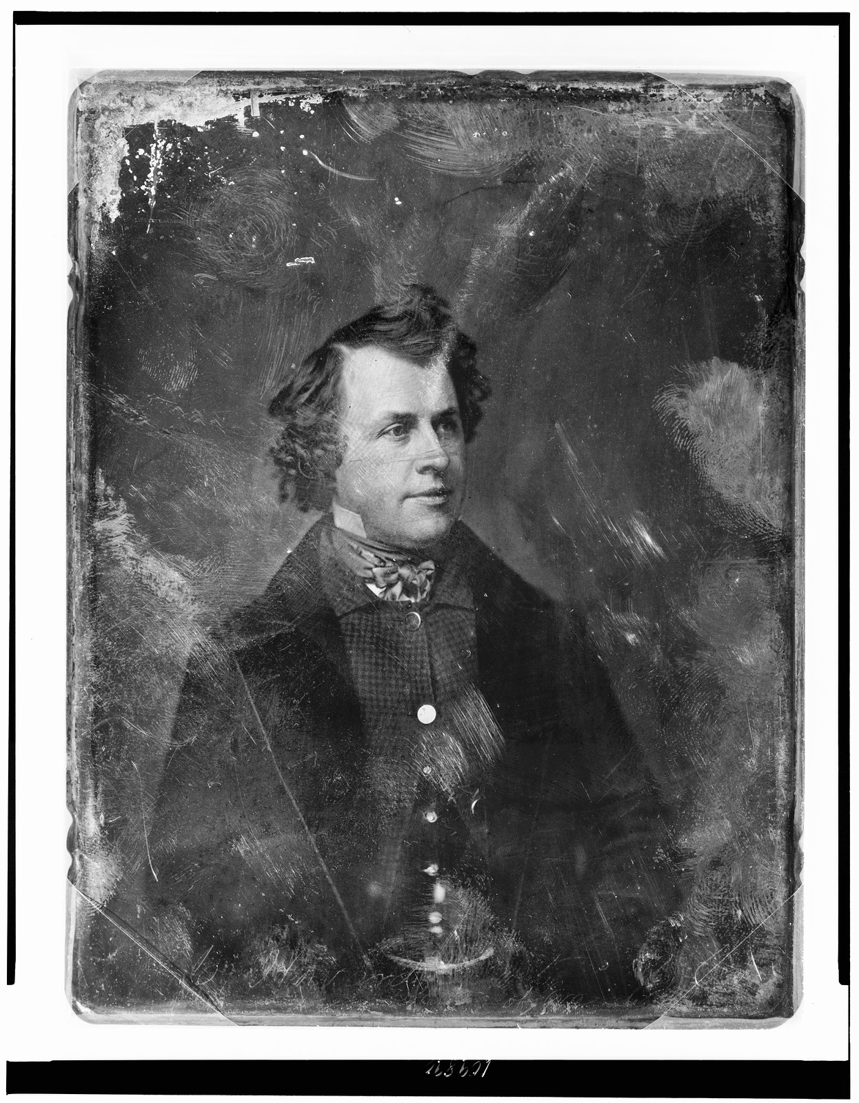 Portrait of a man with curly hair in dark coat, 1851 — historic photograph