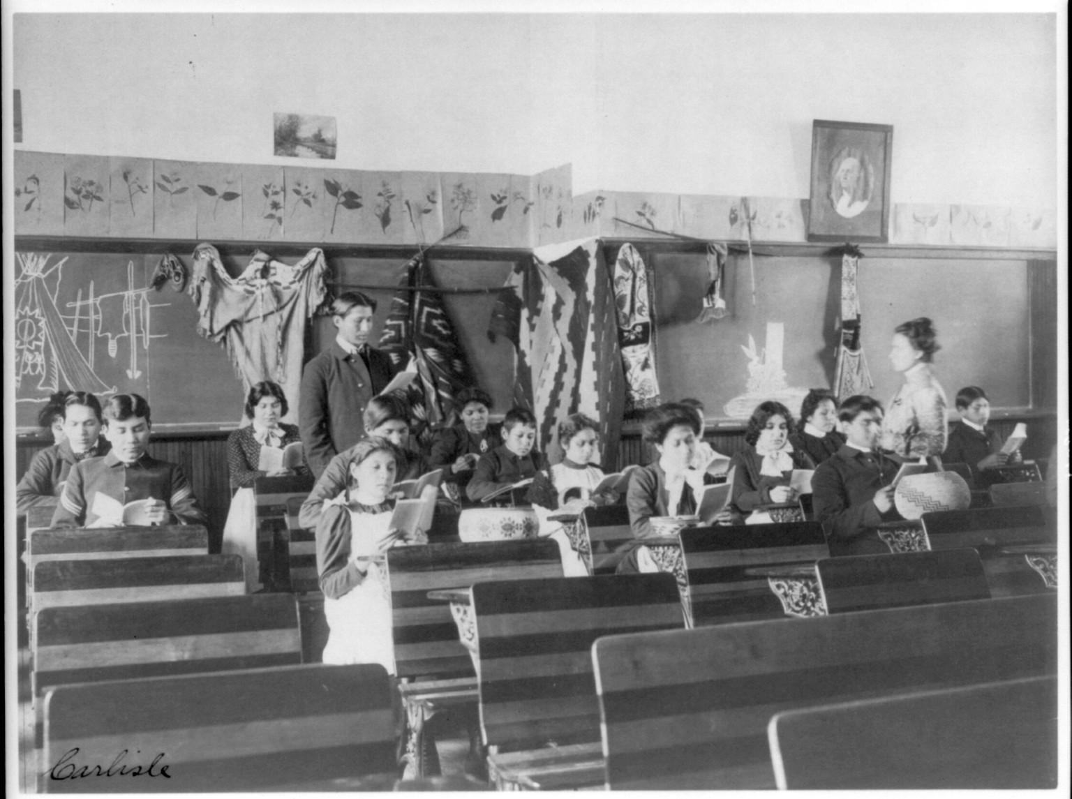 [Male and female students reading in class, Carlisle Indian School, Carlisle, Pennsylvania], [1901] — historic photograph