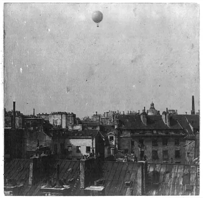[Captive balloon of Henri Giffard over Paris, 1878; high above rooftops]
