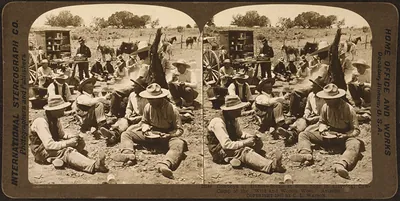 Cowboys at dinner - Scene at noon hour in a typical cowboy camp of the Wild and Wooly West" Arizona"