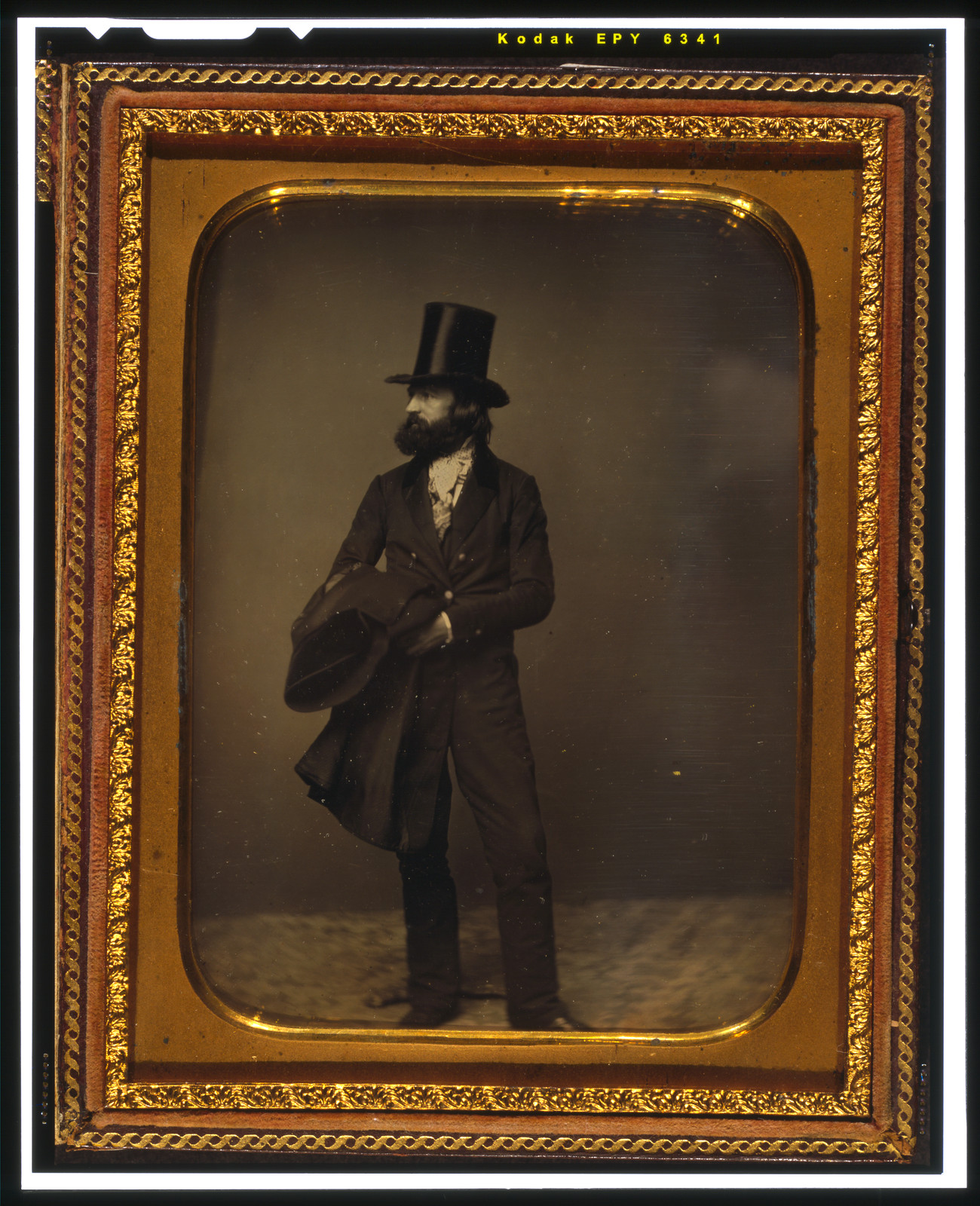 [William Sidney Mount, full length portrait, facing left, wearing top hat and holding a coat], [between 1853 and 1860] — historic photograph
