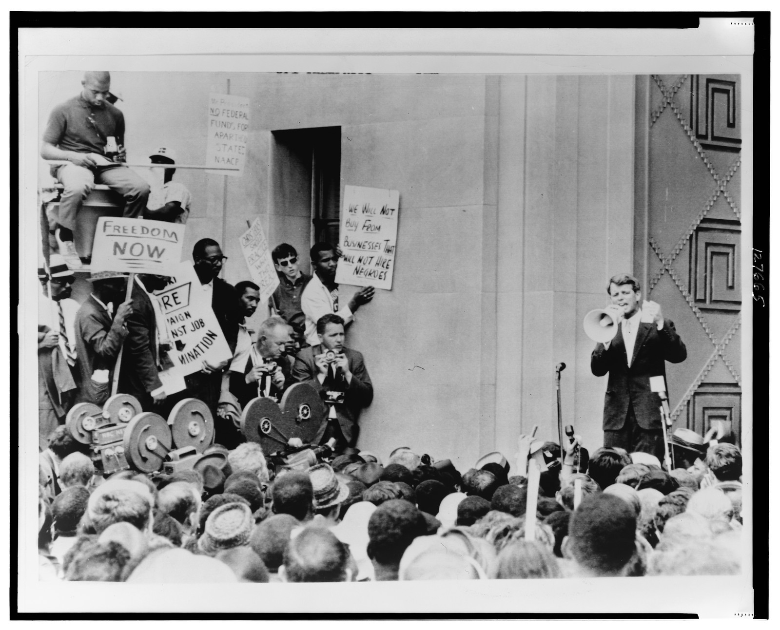 [Robert F. Kennedy using megaphone to address a group of civil rights demonstrators at the Justice Department in Washington, D.C.] — historic photograph