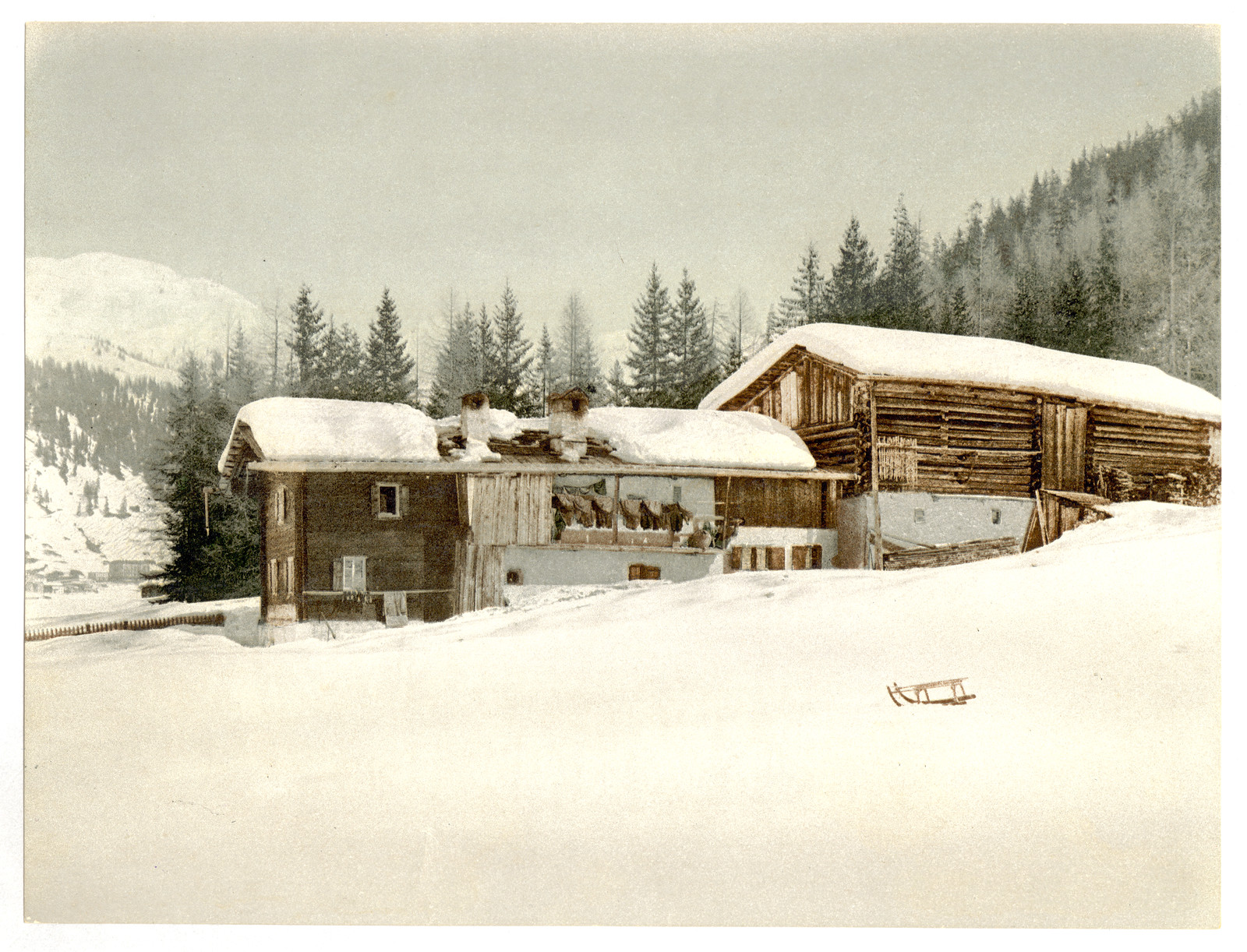 Winter scene with log structure and sled, [between ca. 1890 and ca. 1900]. — historic print