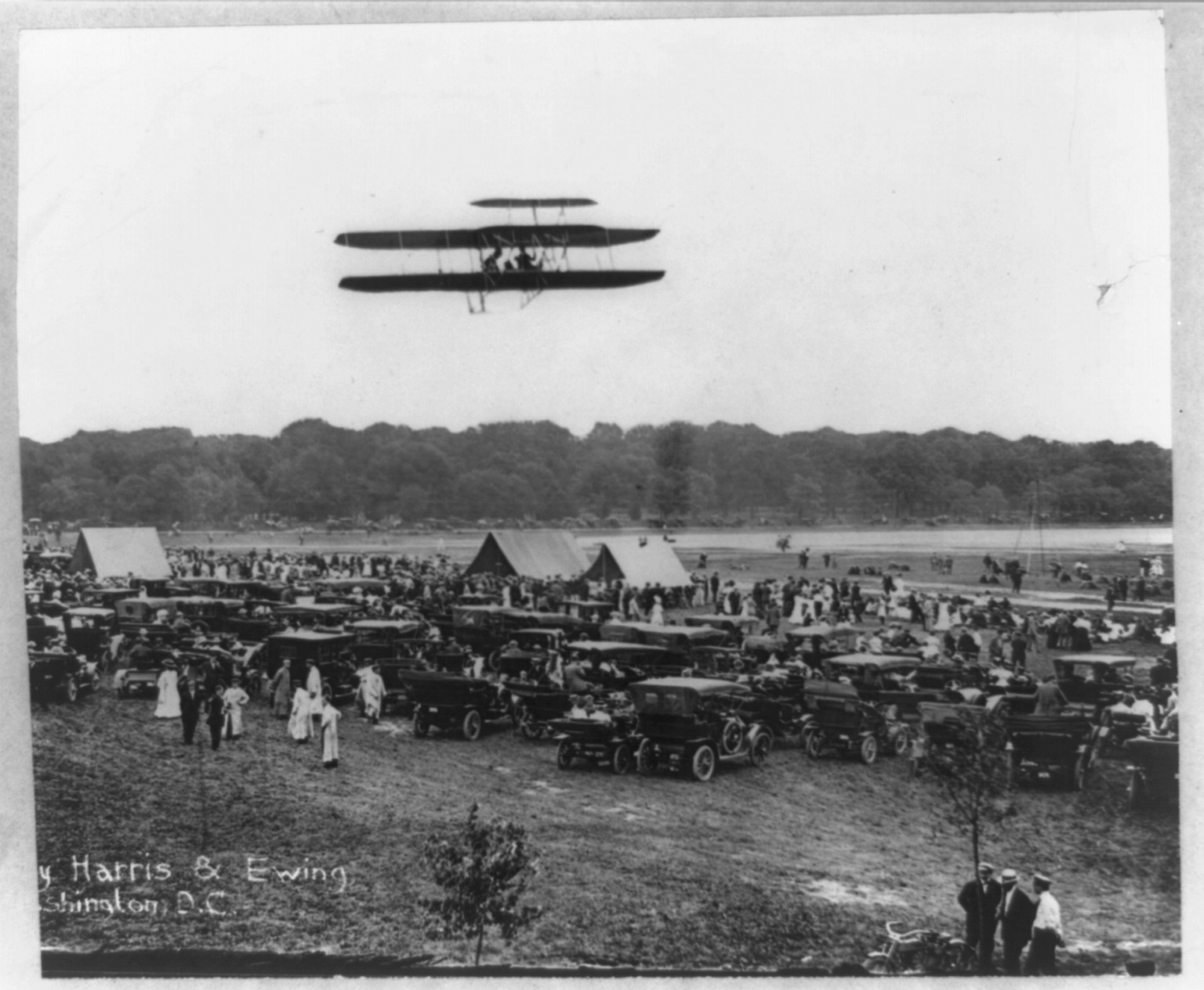 Orville Wright and Lieutenant Lahm of the United States Signal Corps making the world's record flight at Fort Myer, on July 27--The aeroplane made fifty miles at a speed of about forty miles an hour, 1909 July 27. — historic photograph