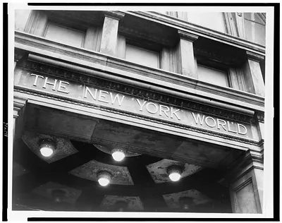 [Close-up of building facade showing lintel inscribed with The New York World"]"