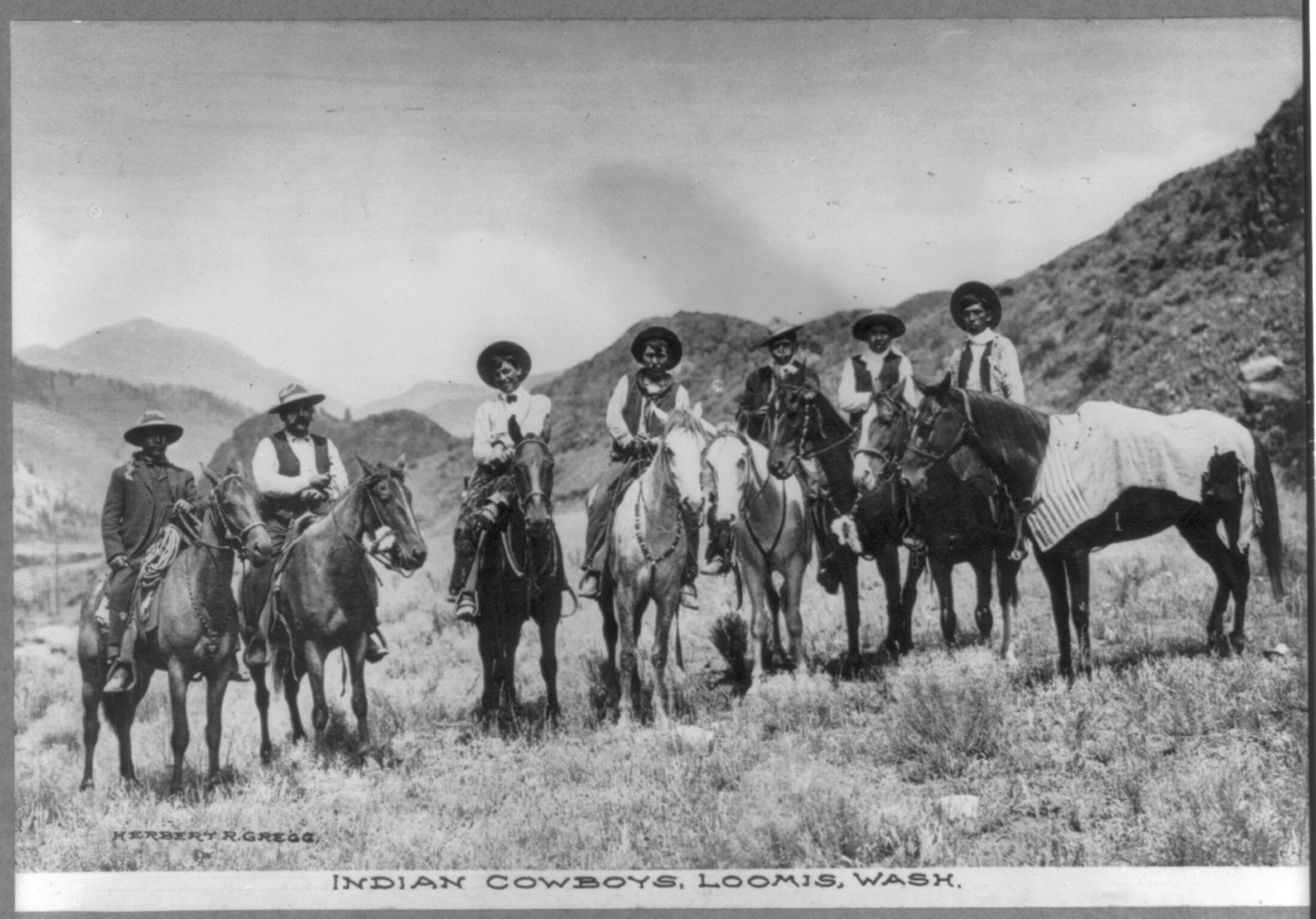 Indian cowboys [on horseback], Loomis, Wash. — historic photograph