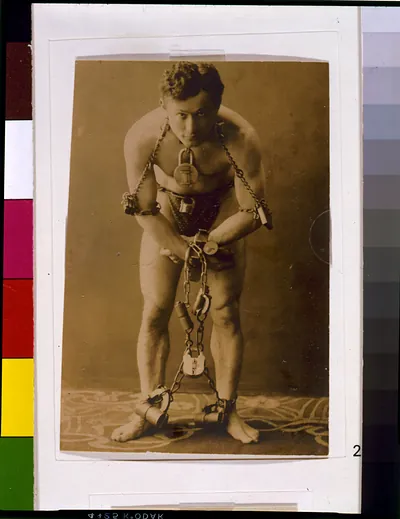 [Harry Houdini, full-length portrait, standing, facing front, in chains]