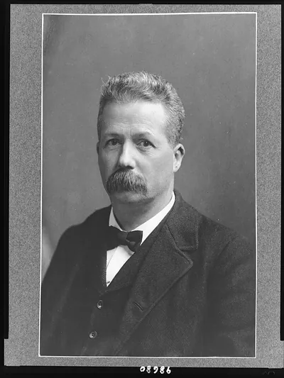 [Clinton Hart Merriam, half-length portrait, facing left]