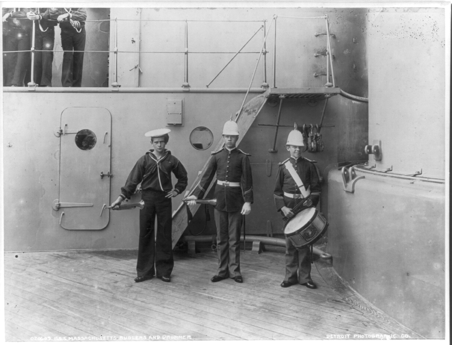 [A Navy bugler, a Marine bugler and a Marine drummer on the U.S.S. Maine] — historic photograph