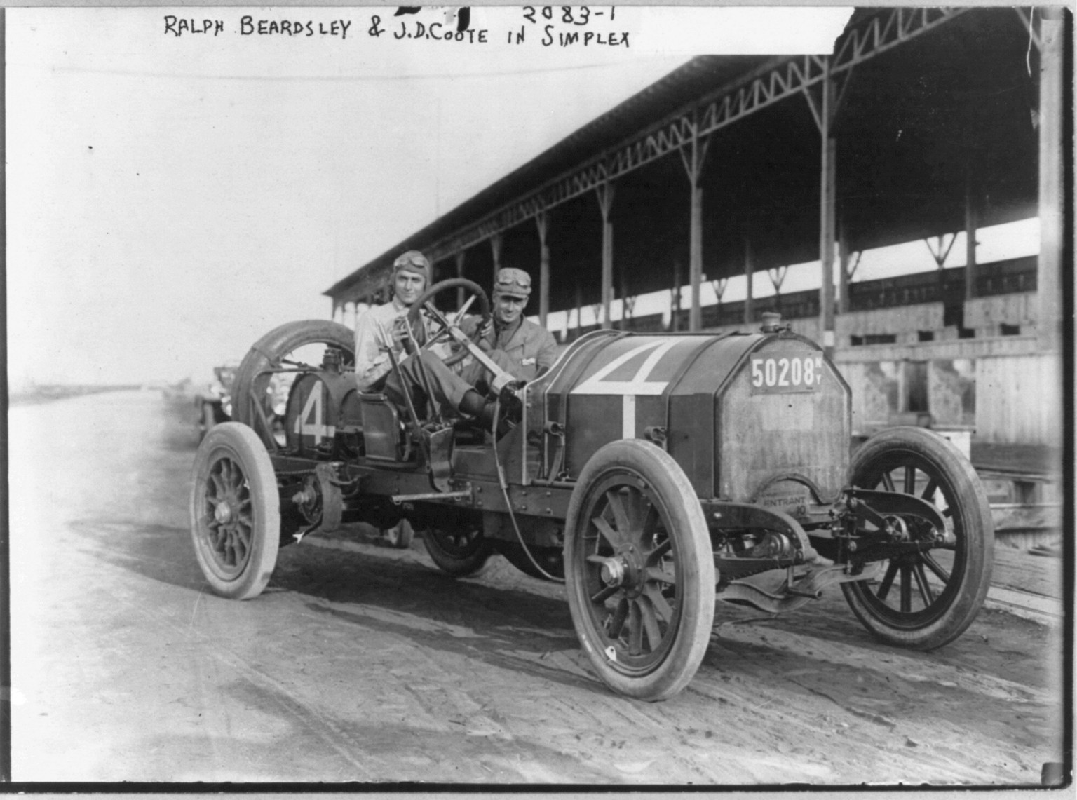 Automobiles - Ralph Beardsley and J.D. Coote in Simplex [on race track], [no date recorded on caption card] — historic photograph