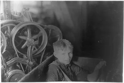 One of the young spinners in the Quidwick Co. Mill. Anthony, R. I. (A Polish boy Willie) who was taking his noon rest in a doffer-box. [...] Location: Anthony, Rhode Island.