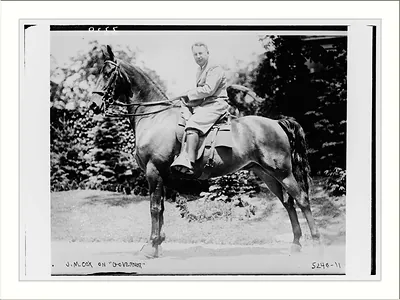 J.M. Cox on "Governor" (horse)