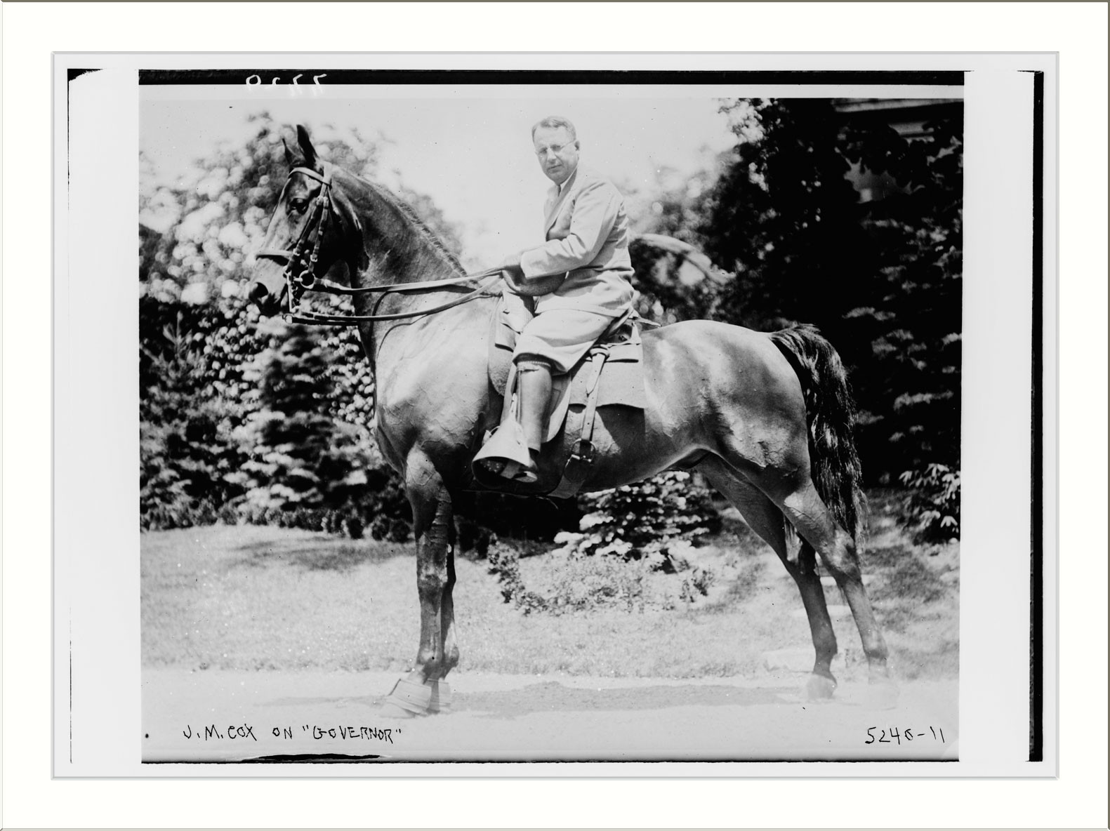 J.M. Cox on "Governor" (horse), n/a — historic photograph