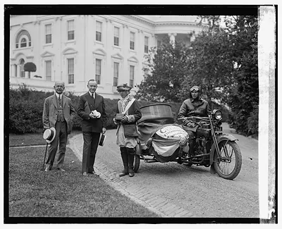 [President Coolidge, sidecar motorcycle, in front of White House], 6/6/24