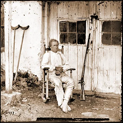 Gettysburg Pa. John L. Burns the old hero of Gettysburg with gun and crutches