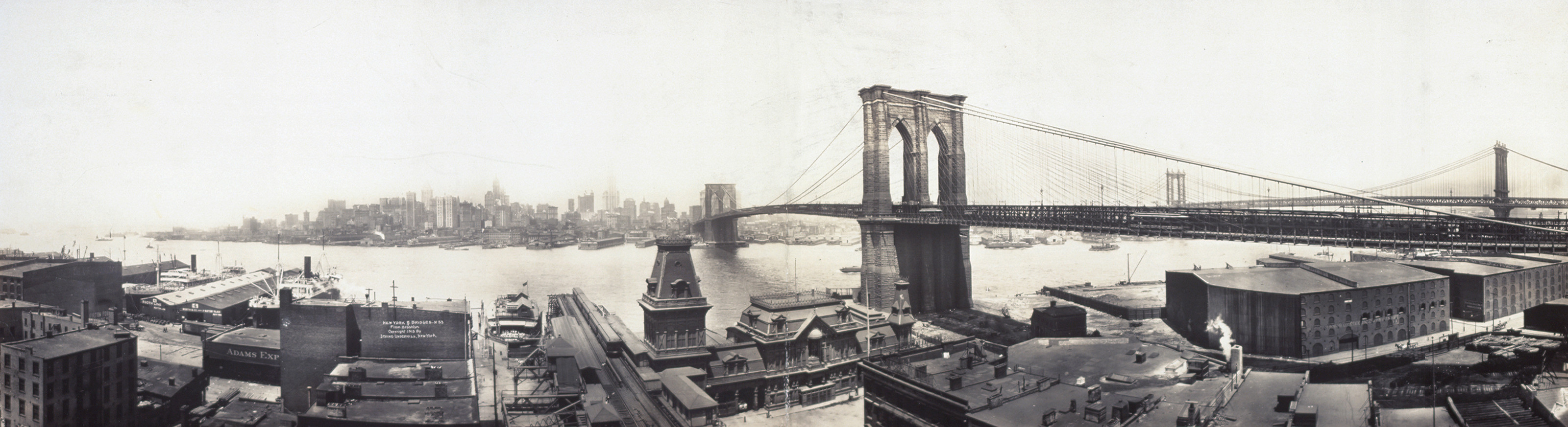 Brooklyn Bridge and Manhattan skyline, black and white panorama — historic image