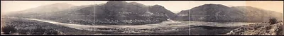 Panoramic view of a mountain valley with a town