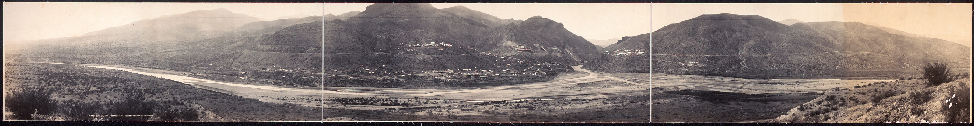 Panoramic view of a mountain valley with a town, 1908 — historic image