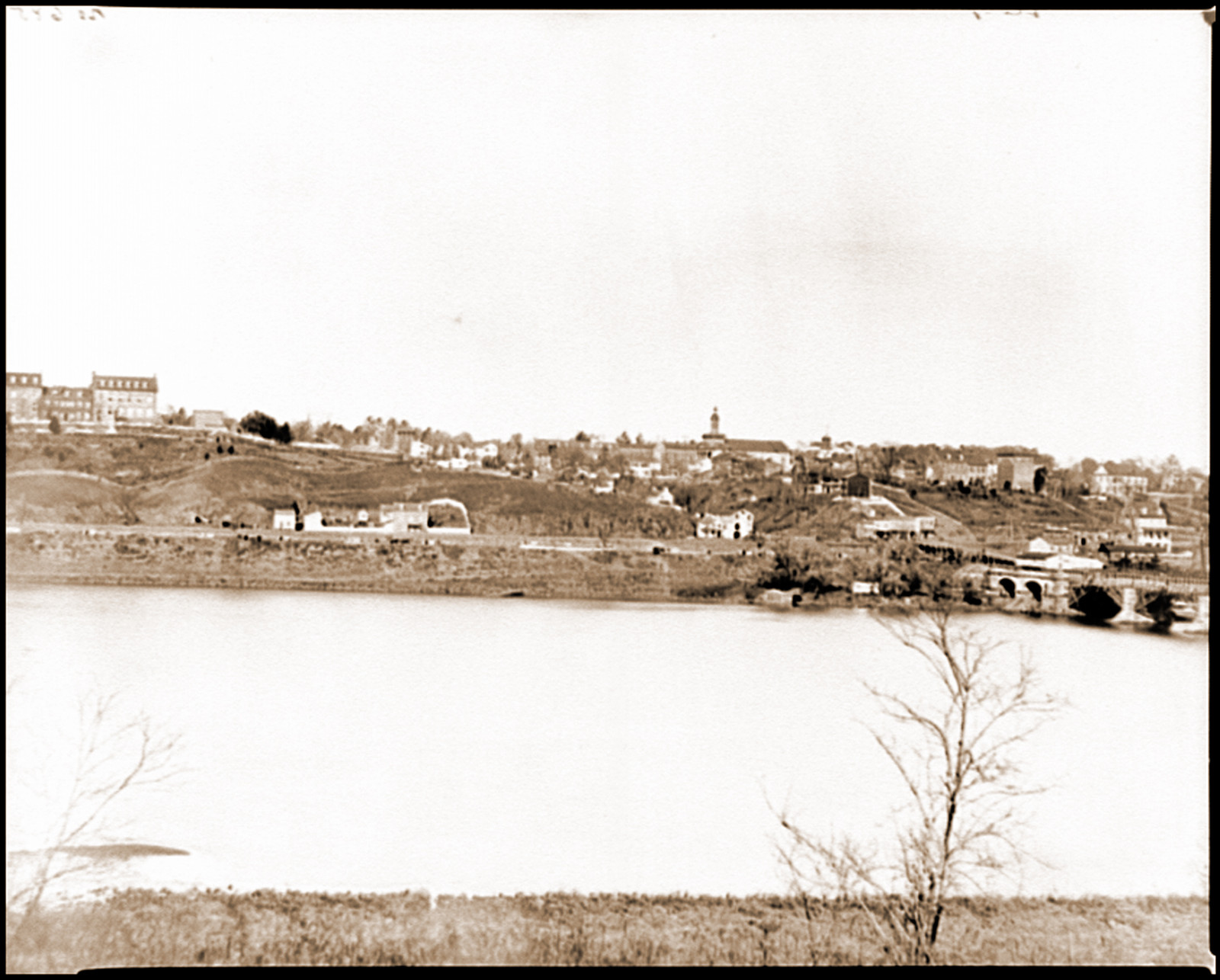 Washington D.C. Georgetown from the Virginia bank; Aqueduct Bridge at the extreme r, 1865 — historic photograph