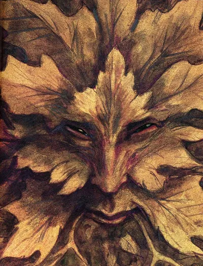 Painted Green Man face formed of leaves
