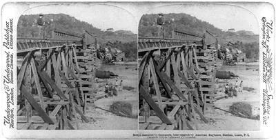 Bridge destroyed by insurgents, later repaired by American Engineers, Bamban, Luzon, P.I.