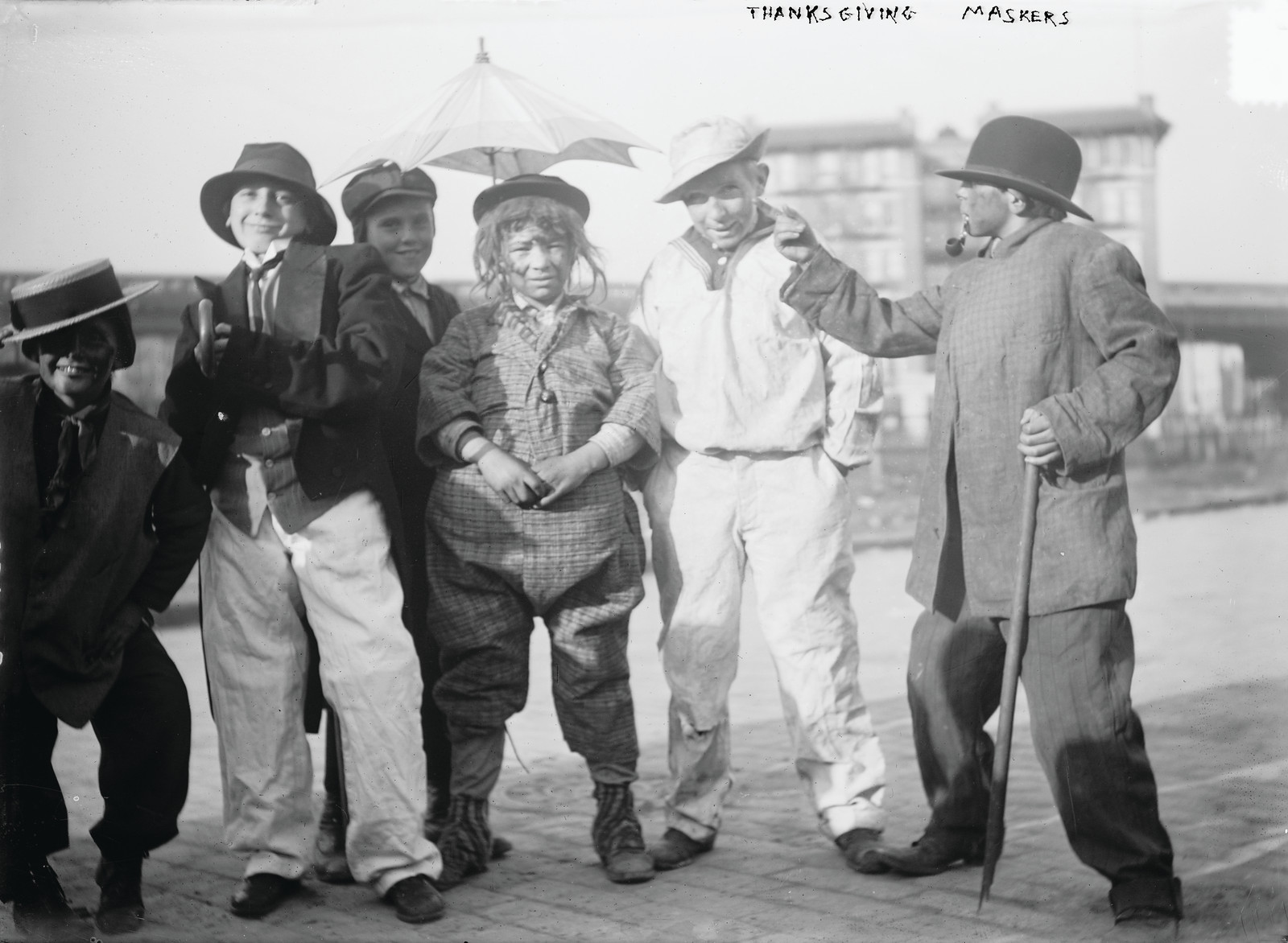 Thanksgiving Maskers, c. 1910-1915 — historic photograph