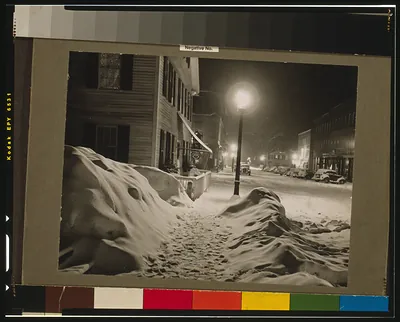 Center of town. Woodstock, Vermont. Snowy night""