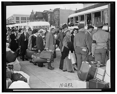San Francisco (Calif.) evacuation - group of evacuees board motor coaches enroute to railroad station for transfer to Santa Anita Assembly Center, the only group to go from this city to Santa Anita