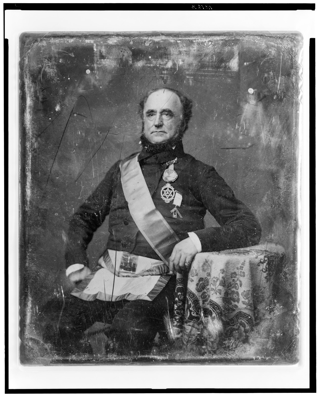 Portrait of a seated man with sash and medals, 1844 — historic photograph