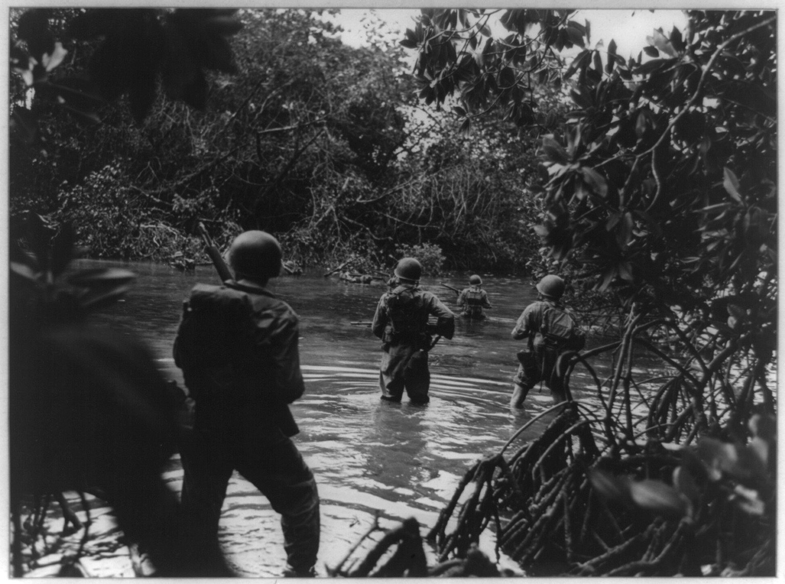 Operations against the Japanese on Arundel and Sagekarsa Islands / photo by Sgt. John Bushemi. — historic photograph