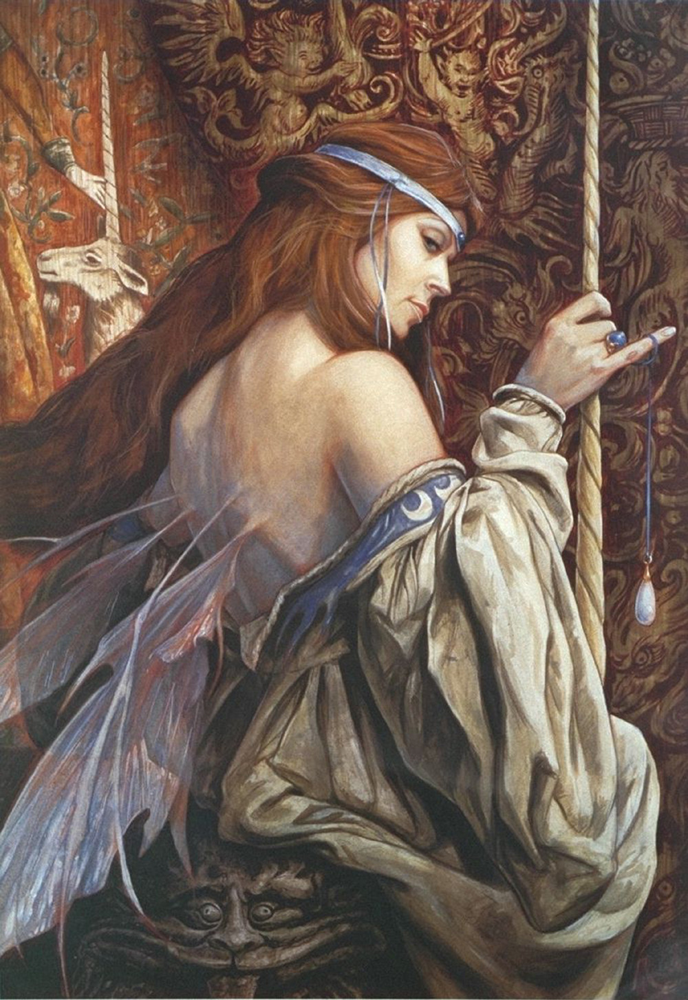 Red-haired winged fairy woman beside a unicorn tapestry — historic image