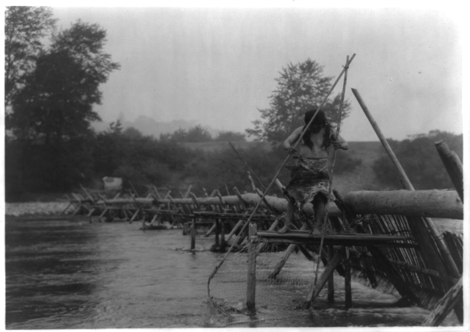 Fish-weir across Trinity River--Hupa, 1923 — historic photograph