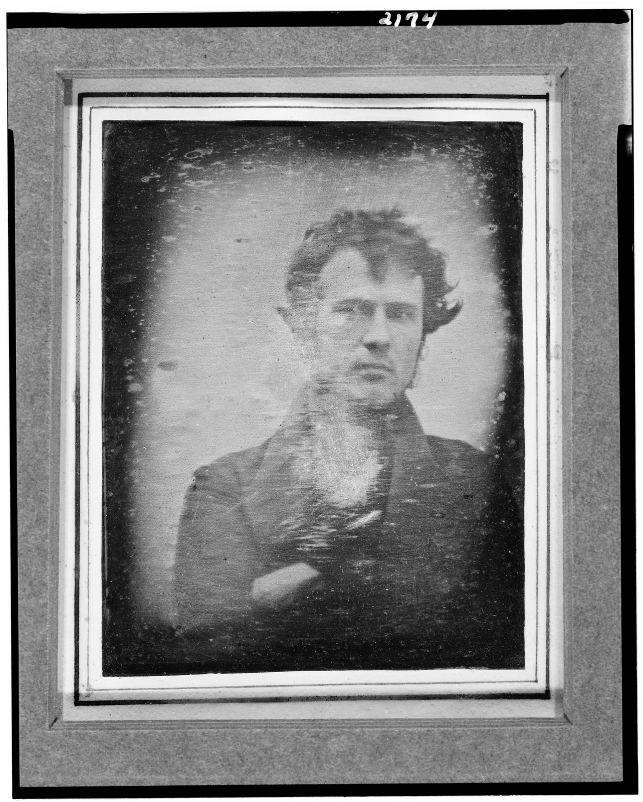 [Robert Cornelius, head-and-shoulders portrait, facing front, with arms crossed], 1839 [Oct. or Nov.] — historic photograph
