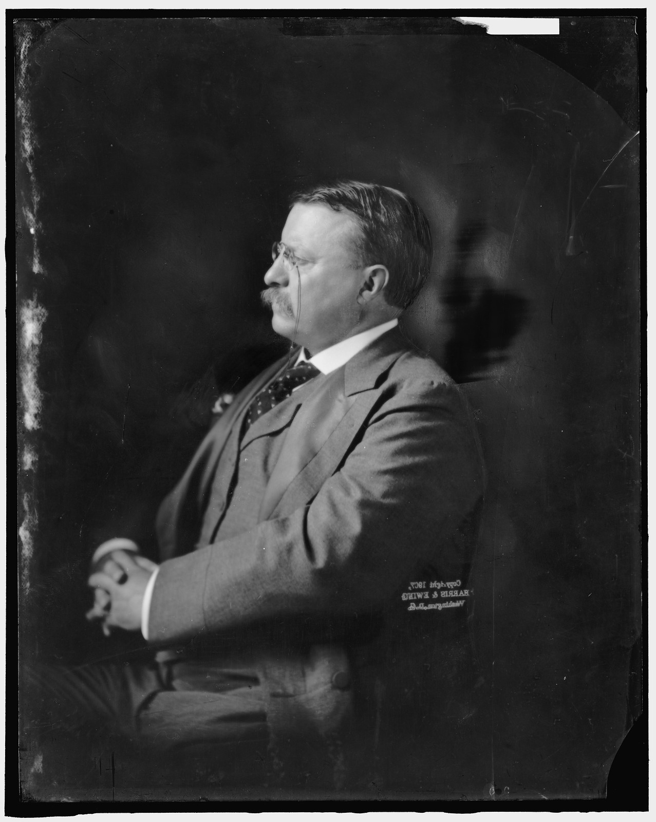 Profile portrait of a man with pince-nez, studio photograph — historic photograph