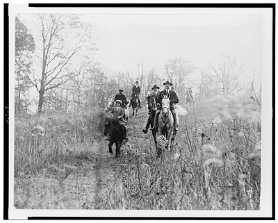 [Men and boy on horses during hunt in Virginia]