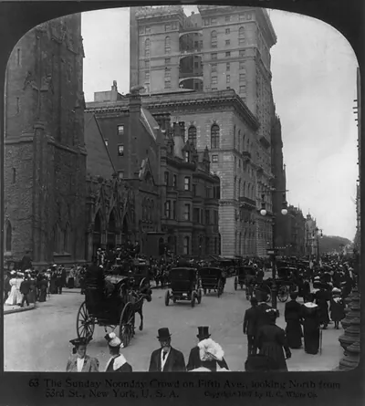 The Sunday noonday crowd on Fifth Ave., looking north from 53rd St., New York