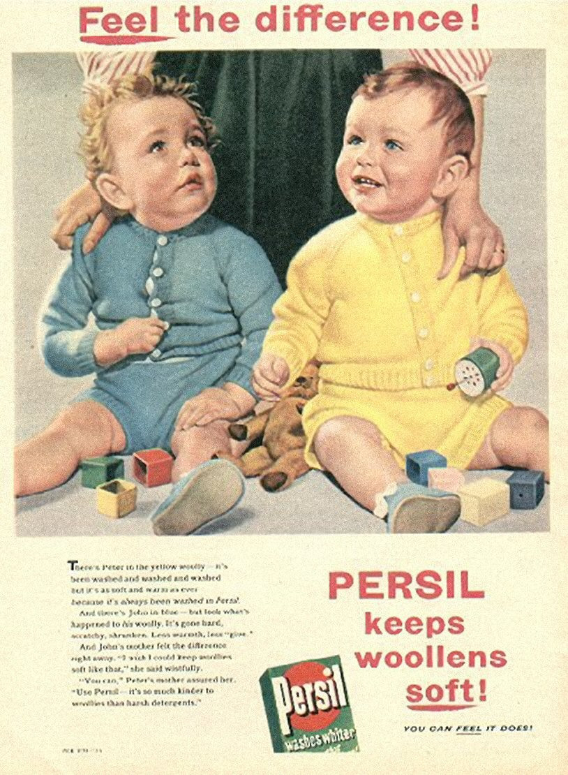 Persil advertisement: two babies in woolens, "Feel the difference — historic image