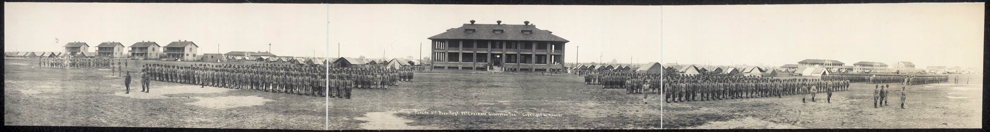 Panoramic photograph of troops in formation on a parade ground — historic photograph