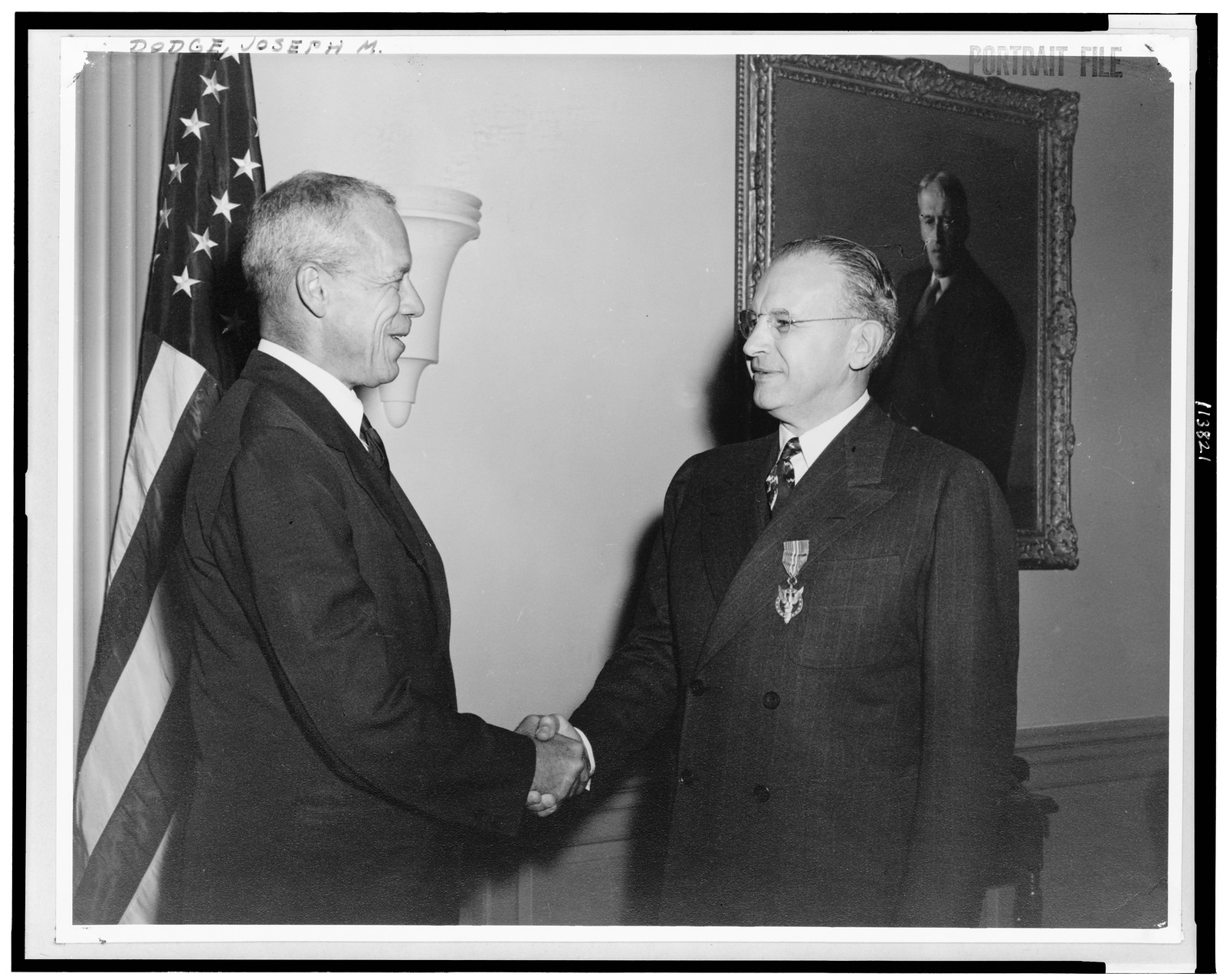 [Joseph M. Dodge receiving Medal for Merit from Secretary of War Robert Patterson, Sept. 18, 1946], 1946 — historic photograph