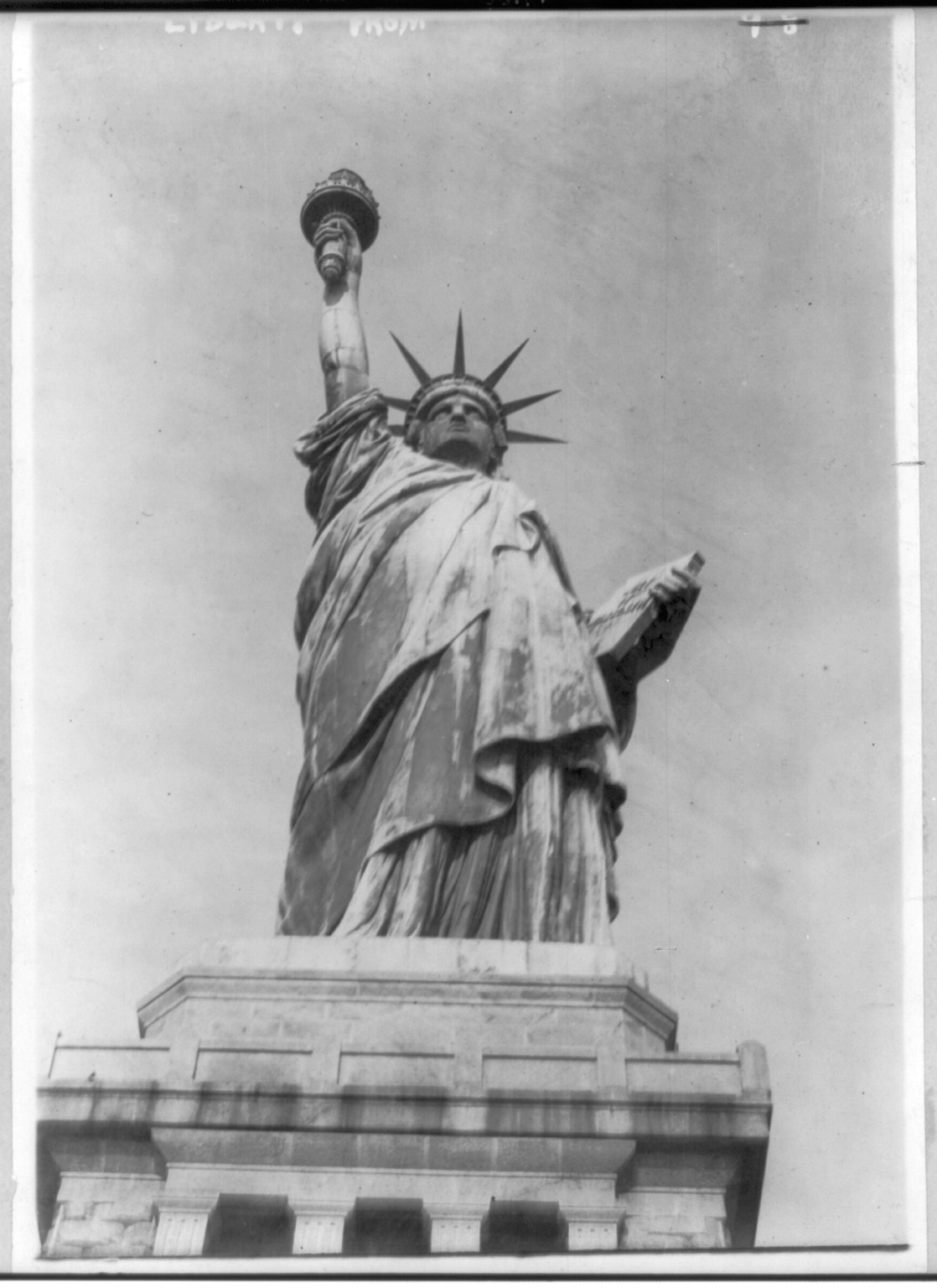 New York City. Bedloe's Island. Statue of Lib.: front view from base, ca. 1908. — historic photograph