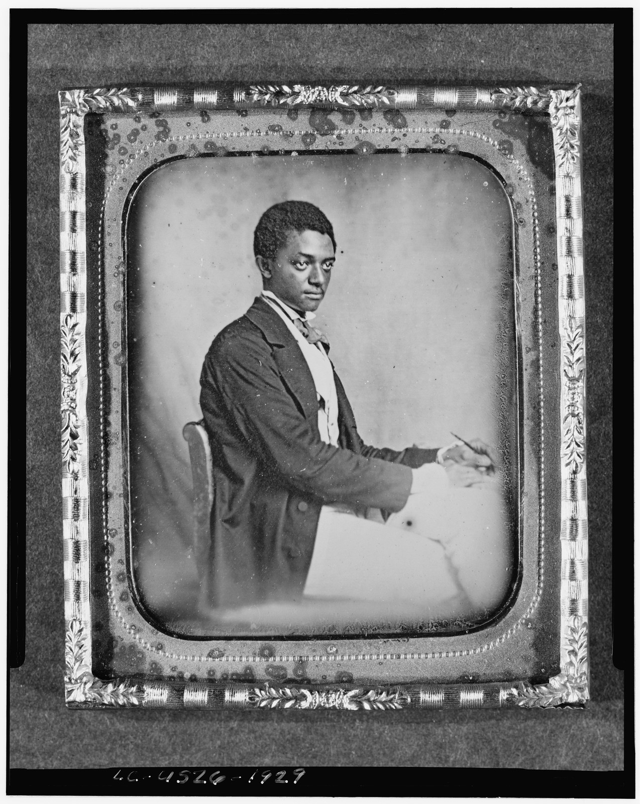 [James B. Yates, three-quarter length portrait, three-quarters view, seated in chair at desk], [between 1856 and 1860] — historic photograph