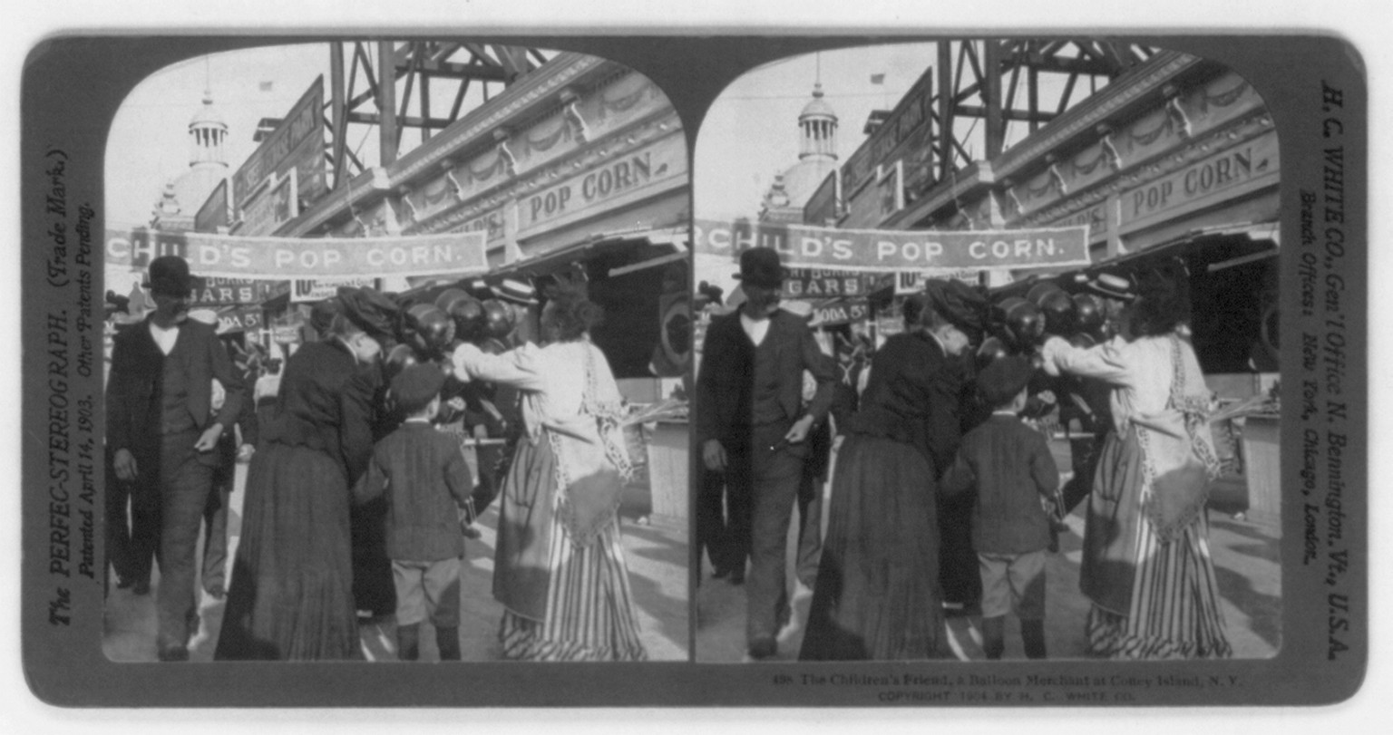 The Children's Friend, a Balloon Merchant at Coney Island, N.Y., c1904. — historic photograph
