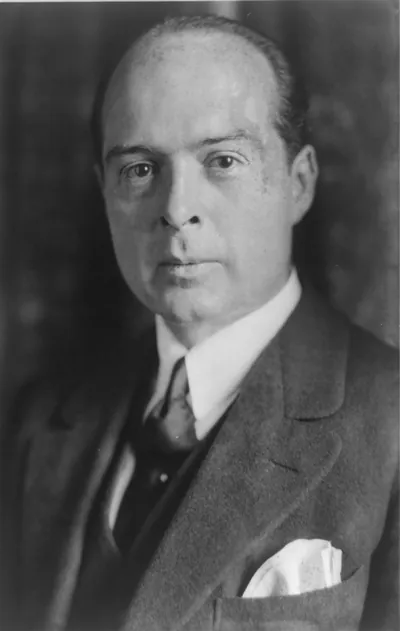 [Leland Harrison, head-and-shoulders portrait, facing left]
